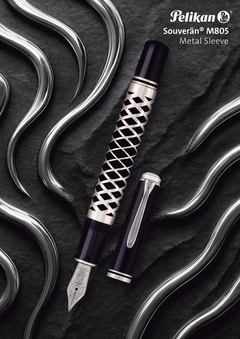 Pelikan Souverän M805 fountain pen with metal sleeve, featuring a sleek design and gold accents on a white background.