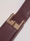 Eng Leather Co. green and burgundy leather pen case with tan interior, designed for holding two pens.