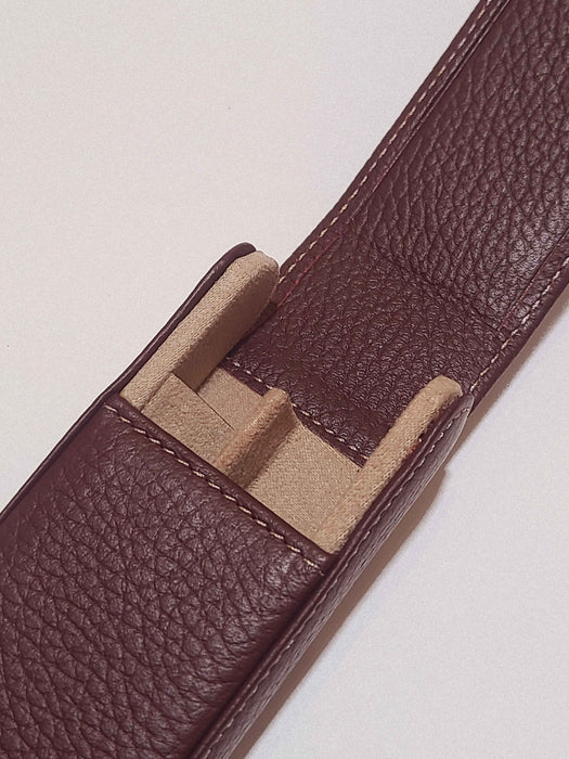 Eng Leather Co. green and burgundy leather pen case with tan interior, designed for holding two pens.