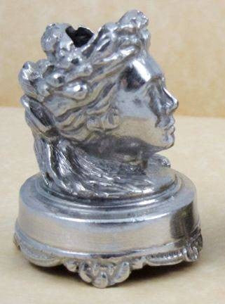 Le Potier D'etain pewter head pen rest, decorative desk accessory for holding pens and stationery.