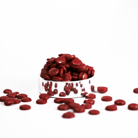 Pink raspberry-shaped wax beads for candle making from Papier Plume, shown in a close-up image.
