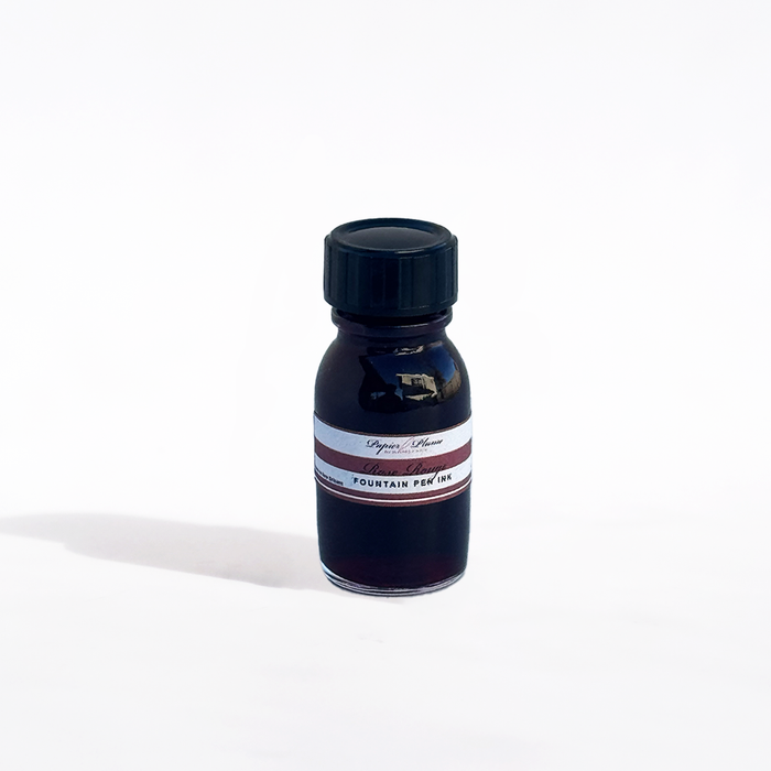 Papier Plume fountain pen ink set of 12 bottles, 15ml each, in vibrant rose rouge color for elegant writing and calligraphy.