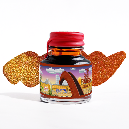 Papier Plume Rusty Rainbow shimmer fountain pen ink bottle with colorful ink swatch on label.