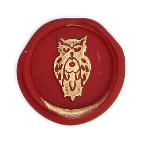Bortoletti Symbol wax seal in gold with intricate design, used for sealing letters and invitations.