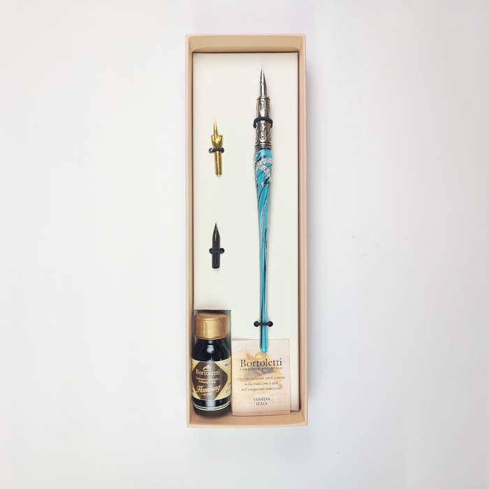 Bortoletti glass dipping pen set with 20 turquoise pens, elegant writing tools for calligraphy and artistic lettering.
