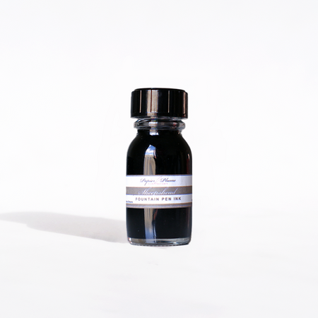 Papier Plume Sheepshead fountain pen ink in 15ml bottle, dark ink with a smooth flow for elegant writing.