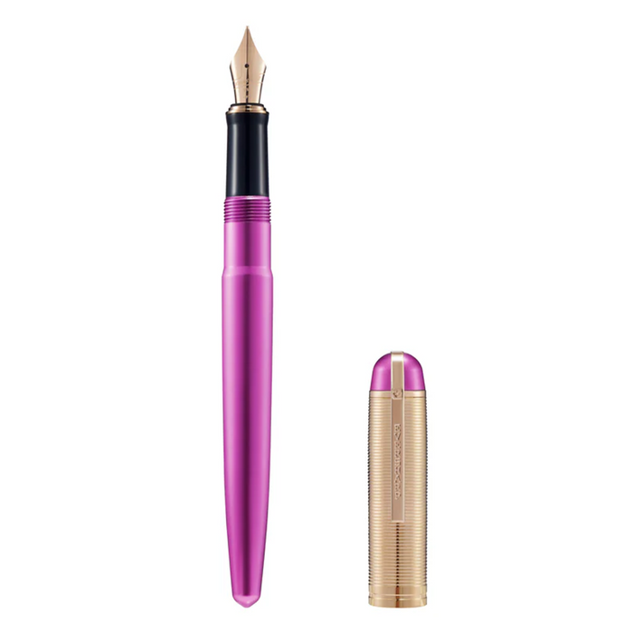 Wahl-Eversharp Skyline fountain pen with royal purple body and rose gold trim, showcasing elegant writing instrument design.