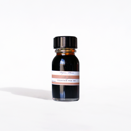 Papier Plume St. Joe fountain pen ink bottle, 15ml, with ink filling the transparent glass container and label visible.