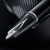 Sheaffer Legacy black fountain pen with sleek design and gold accents, featuring a smooth nib and elegant craftsmanship.