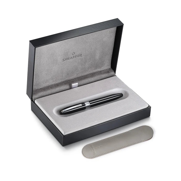 Sheaffer Legacy black fountain pen with gold accents, showcasing a sleek and elegant writing instrument.