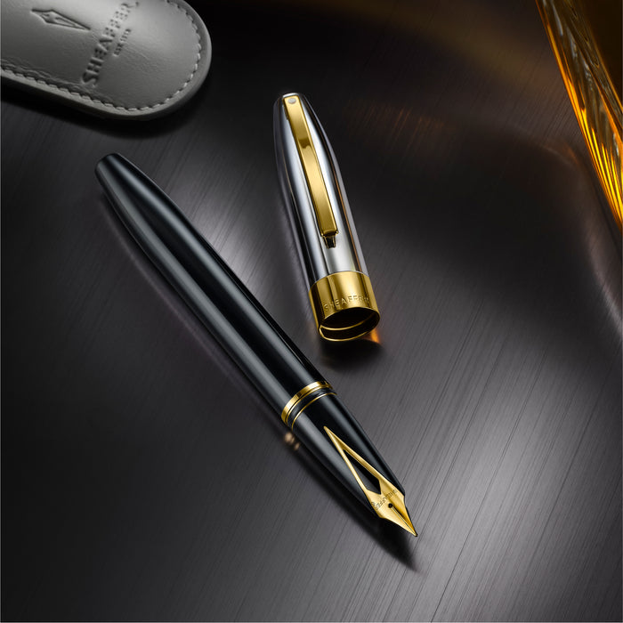 Sheaffer Legacy black fountain pen with chrome cap, featuring a sleek design and elegant detailing.