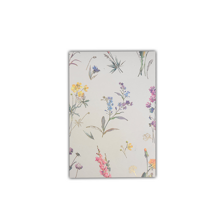 Kartos wildflower memo pad featuring colorful floral illustrations on paper pages for note-taking and reminders.