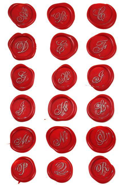 Bortoletti Script Monogram Seal wax seal with intricate monogram design on a white background.