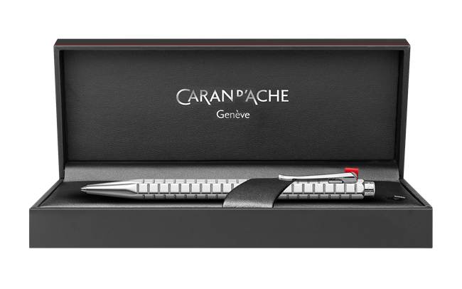 Caran D'Ache Platinum-Coated Ecridor Avenue rollerball pen with detailed close-up of the gold finish and engraved accents.