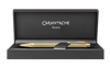 Caran D'Ache Gilded Ecridor Chevron ballpoint pen with gold accents and intricate chevron design, close-up detail image.