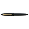 Esterbrook Estie fountain pen with ebony barrel and gold fittings, showcasing elegant design and craftsmanship.