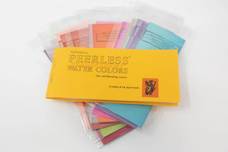 Peerless Watercolors Original 1885 Complete Edition set of watercolor paints in a compact, vintage-inspired tin container.