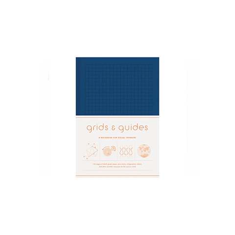 Large navy Grid & Guides journal by Princeton Architectural Press featuring grid-lined pages for sketching and note-taking.