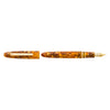 Esterbrook Estie fountain pen with gold fittings, featuring a honeycomb patterned barrel and smooth ink nib for writing elegance.
