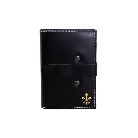 Black Italian leather refillable latch journal with a sleek cover, ideal for daily planning and note-taking in 2025.