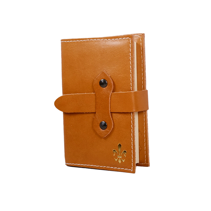 Medium orange Italian leather refillable latch journal by Il Cartiglio with a sleek cover design.
