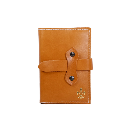 Orange Italian leather refillable latch journal with a medium size, perfect for daily planning and note-taking by Il Cartiglio.