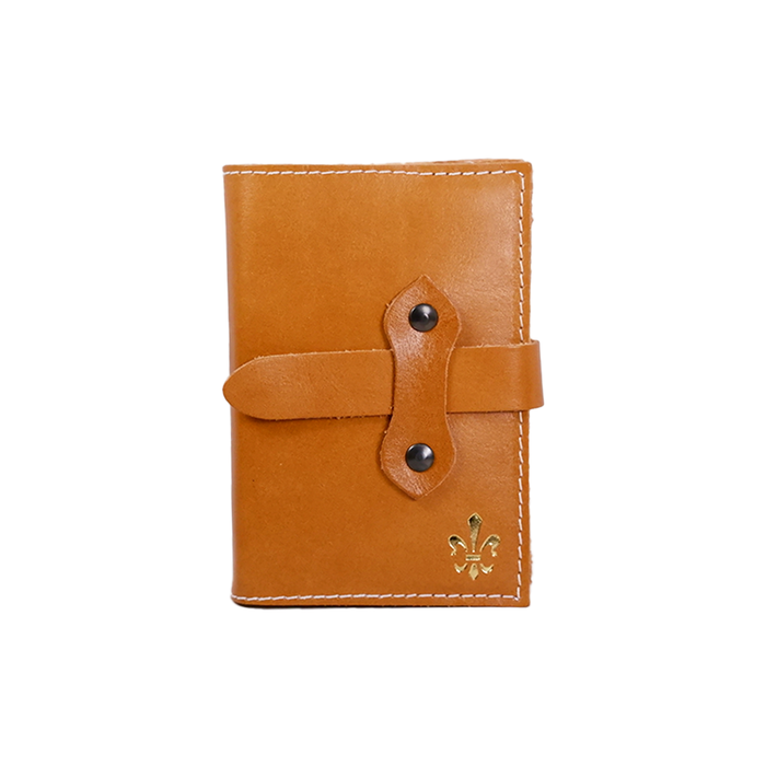 Orange Italian leather refillable latch journal with a medium size, perfect for daily planning and note-taking by Il Cartiglio.