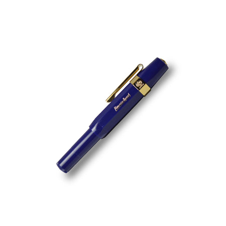 Gold Kaweco pen clip accessory attached to a fountain pen for secure and stylish writing.