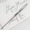 Le Potier D'etain pewter dip calligraphy pen with fleur-de-lys design, ideal for elegant writing and artistic calligraphy projects.