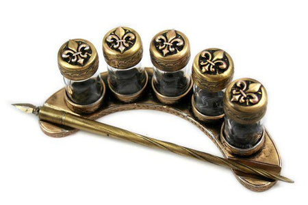Bronzed Crescent Five Ink Bottle Set by Le Potier D'etain, featuring five elegant ink bottles with intricate filigree designs.