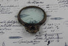 Large pewter magnifying glass with handle and acanthus design by Le Potier D'etain, showcasing intricate craftsmanship.