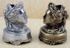 Pewter head-shaped pen rest by Le Potier D'etain, designed to hold writing pens on a desk or workspace.