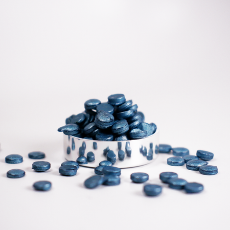Metallic turquoise wax beads by Papier Plume, shiny and smooth, perfect for candle making or crafts.