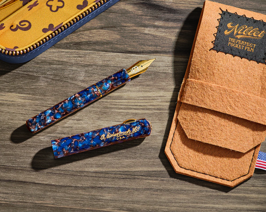 Esterbrook Niblet fountain pen with sleek metal body and fine nib, showcasing its elegant design and craftsmanship.