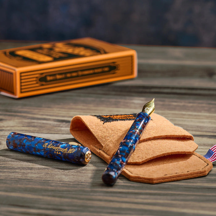 Esterbrook Niblet fountain pen with a sleek design, showcasing the nib and smooth black barrel in the image.
