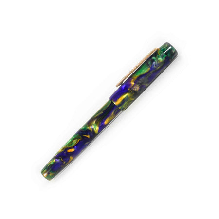 Papier Plume x Hardy Penwrights Krewe of Calliope fountain pen with gold accents and black resin body, shown close-up.