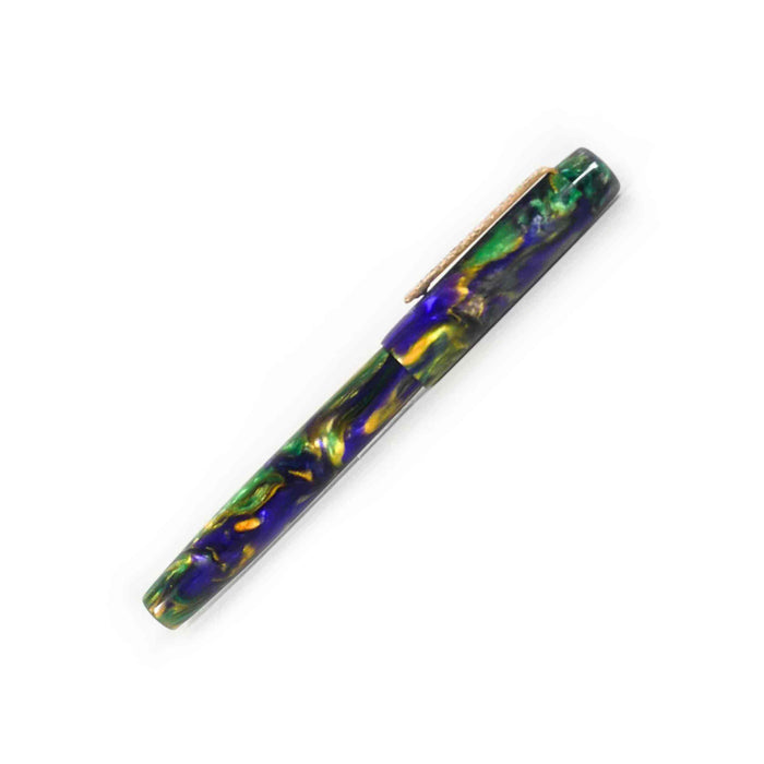 Papier Plume x Hardy Penwrights Krewe of Calliope fountain pen with gold accents and black resin body, shown close-up.