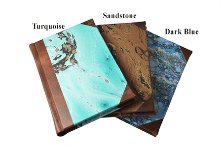 Handcrafted leather-trimmed journal with marbled paper and modern spine, small lined pages, by Il Cartiglio.