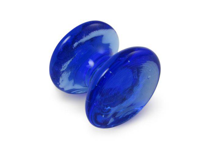 Amber glass pen rest by Papier Plume, elegantly shaped to hold pens and keep writing surfaces tidy.