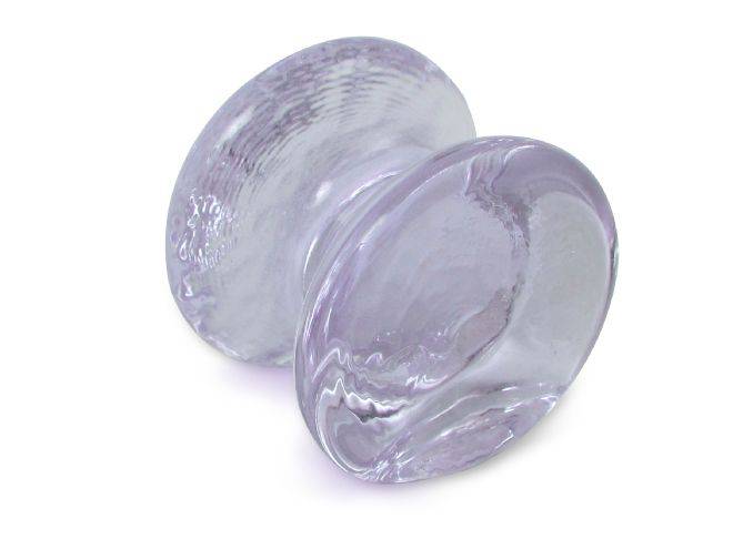 Amber glass pen rest by Papier Plume, elegant and smooth, designed to hold pens securely on a desk or writing space.