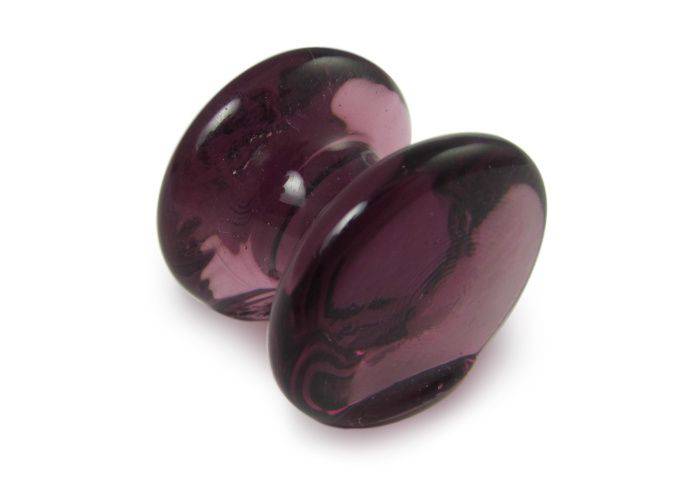 Amber glass pen rest by Papier Plume, elegant and smooth, designed to hold pens securely on a desk or workspace.
