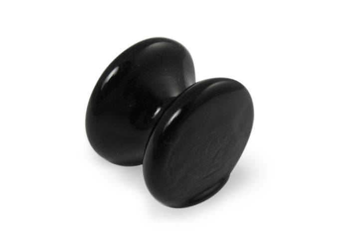 Amber glass pen rest by Papier Plume, elegant and smooth, designed to hold pens securely on a desk or workspace.