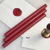 Black pliable sealing wax sticks from Papier Plume, 7 inches long, used for sealing and decorative purposes.