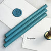Black pliable sealing wax sticks by Papier Plume, 7 inches long, ideal for sealing and decorative wax applications.