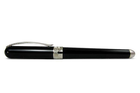 Pineider Avatar UR fountain pen in Graphene Black with gold accents, showcasing its sleek, elegant design and fine nib.