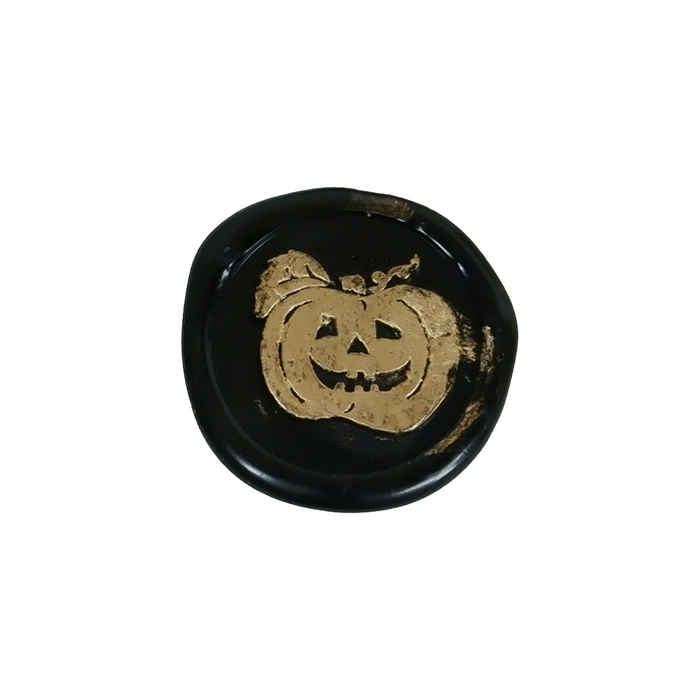 Papier Plume Halloween wax seal featuring a carved pumpkin design, perfect for sealing letters or decorations.