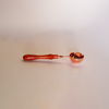 Rose gold Papier Plume wax melting spoon with smooth handle and rounded bowl for easy wax melting and application.