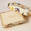 Set of Rossi Feather Notecards featuring elegant feather designs on high-quality stationery for writing notes and messages.