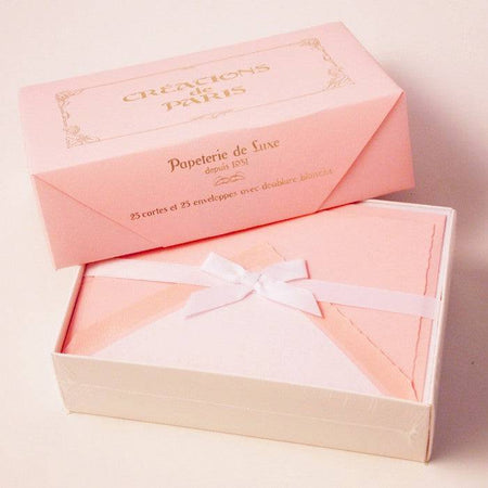 Purple Rossi stationery set featuring flat deckled edge cards and lined envelopes for elegant correspondence.