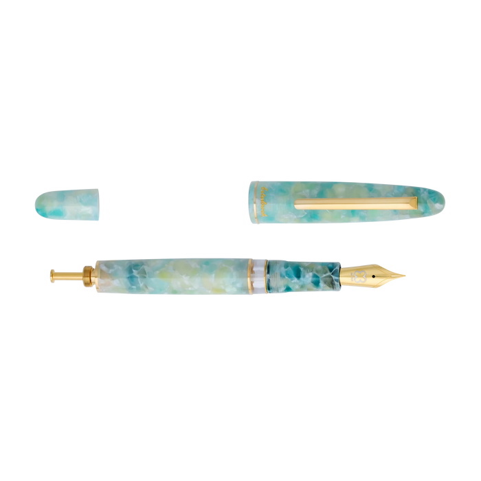 Open Esterbrook Estie push button fountain pen in seaglass color with a sleek design and smooth writing tip.